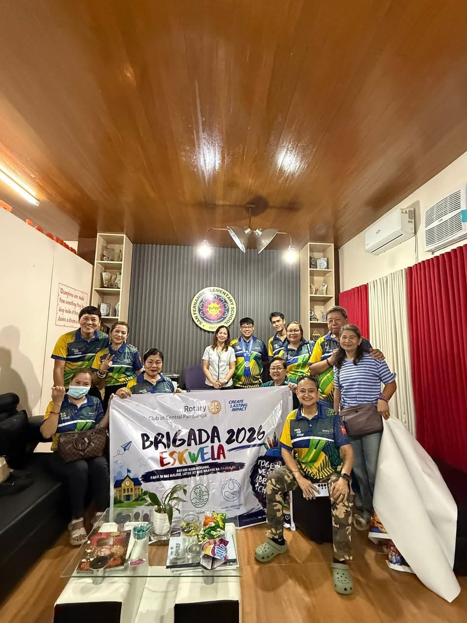 RCCP members with the Brigada Eskwela banner at San Fernando Elementary School